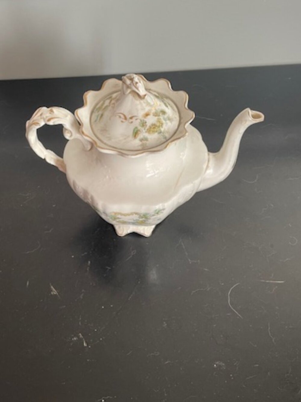 A White Porcelain China Tea Pot. White floral color. Made in Liverpool England